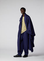 A model wears the IM MEN COCOON coat.