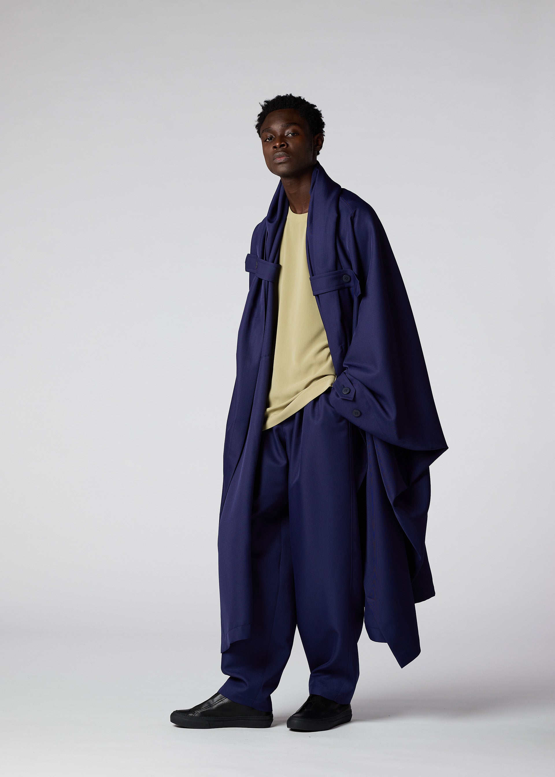 A model wears the IM MEN COCOON coat.