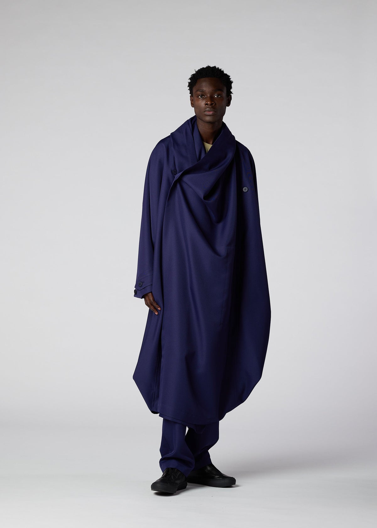 A model wears the IM MEN COCOON coat.