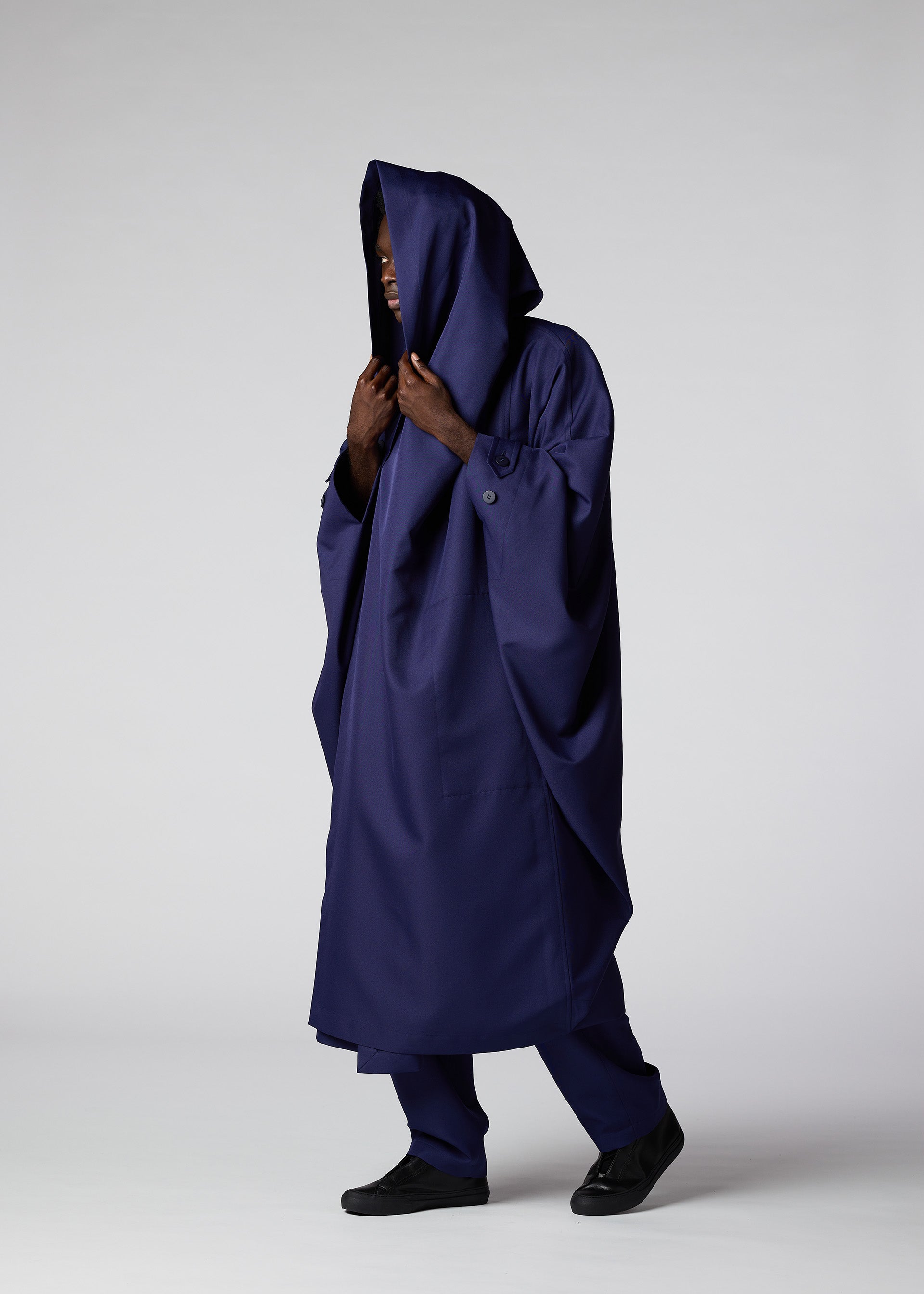A model wears the IM MEN COCOON coat.