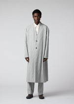 A model wears the IM MEN FLY WOOL coat.