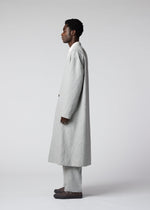 A model wears the IM MEN FLY WOOL coat.