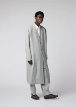 A model wears the IM MEN FLY WOOL coat.