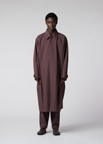 A model wears the IM MEN FLAT clothing.