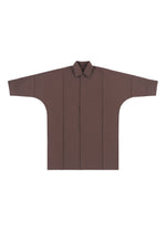 A detail shot of the IM MEN FLAT clothing.