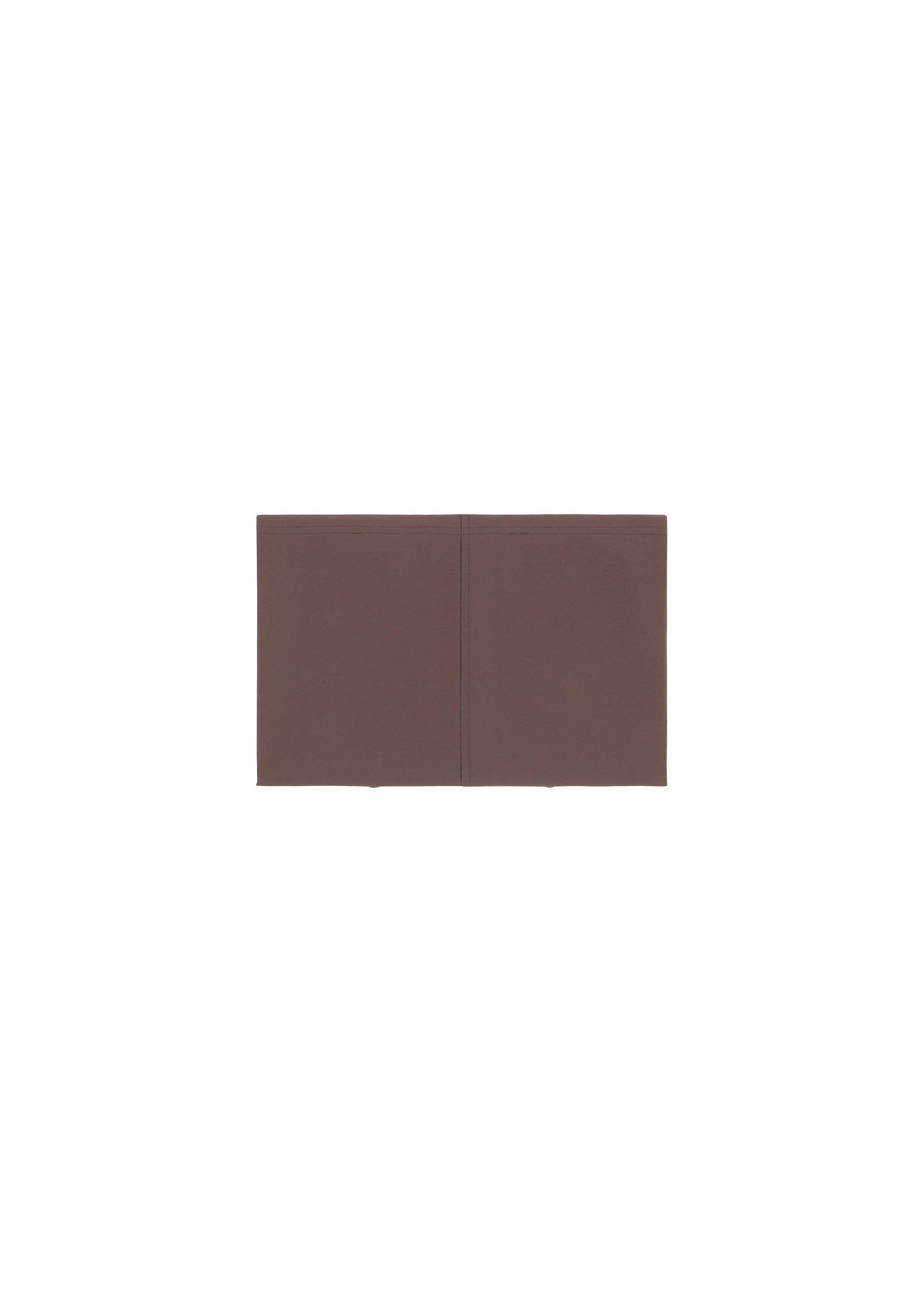 A detail shot of the IM MEN FLAT clothing.