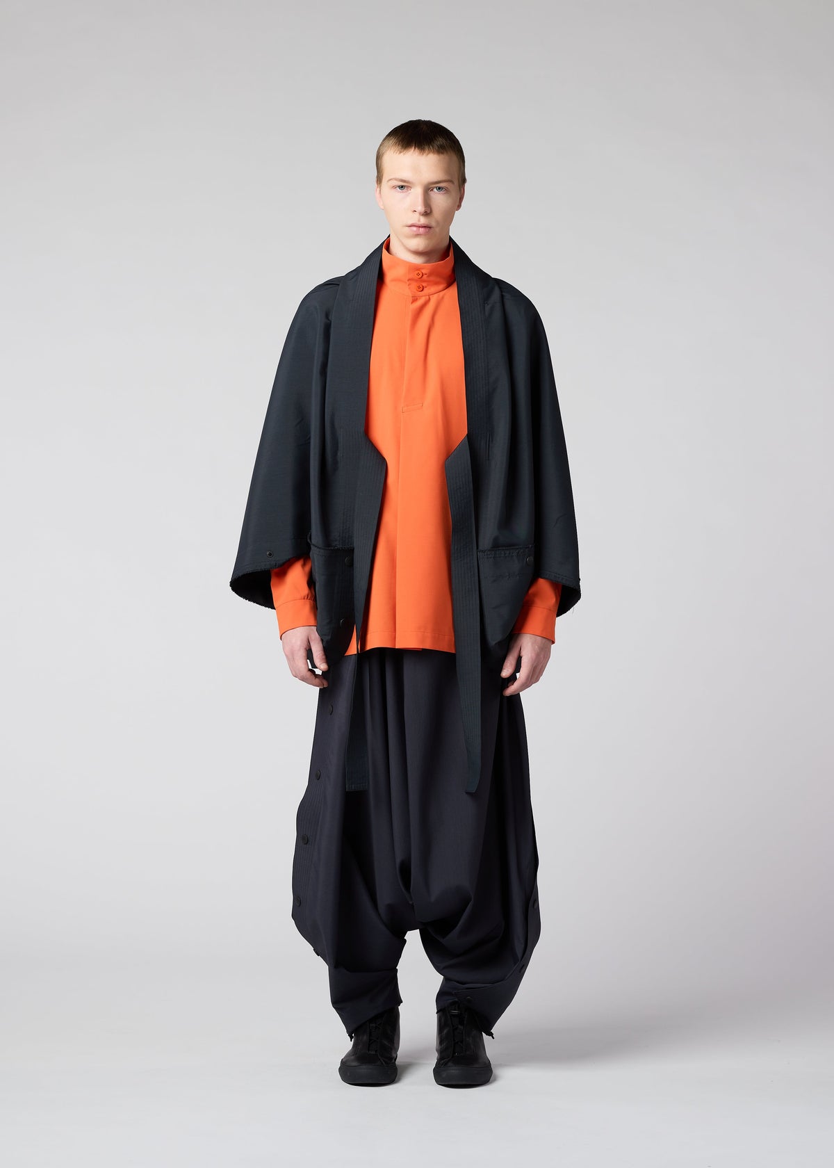 A model wears the IM MEN FLY jacket.