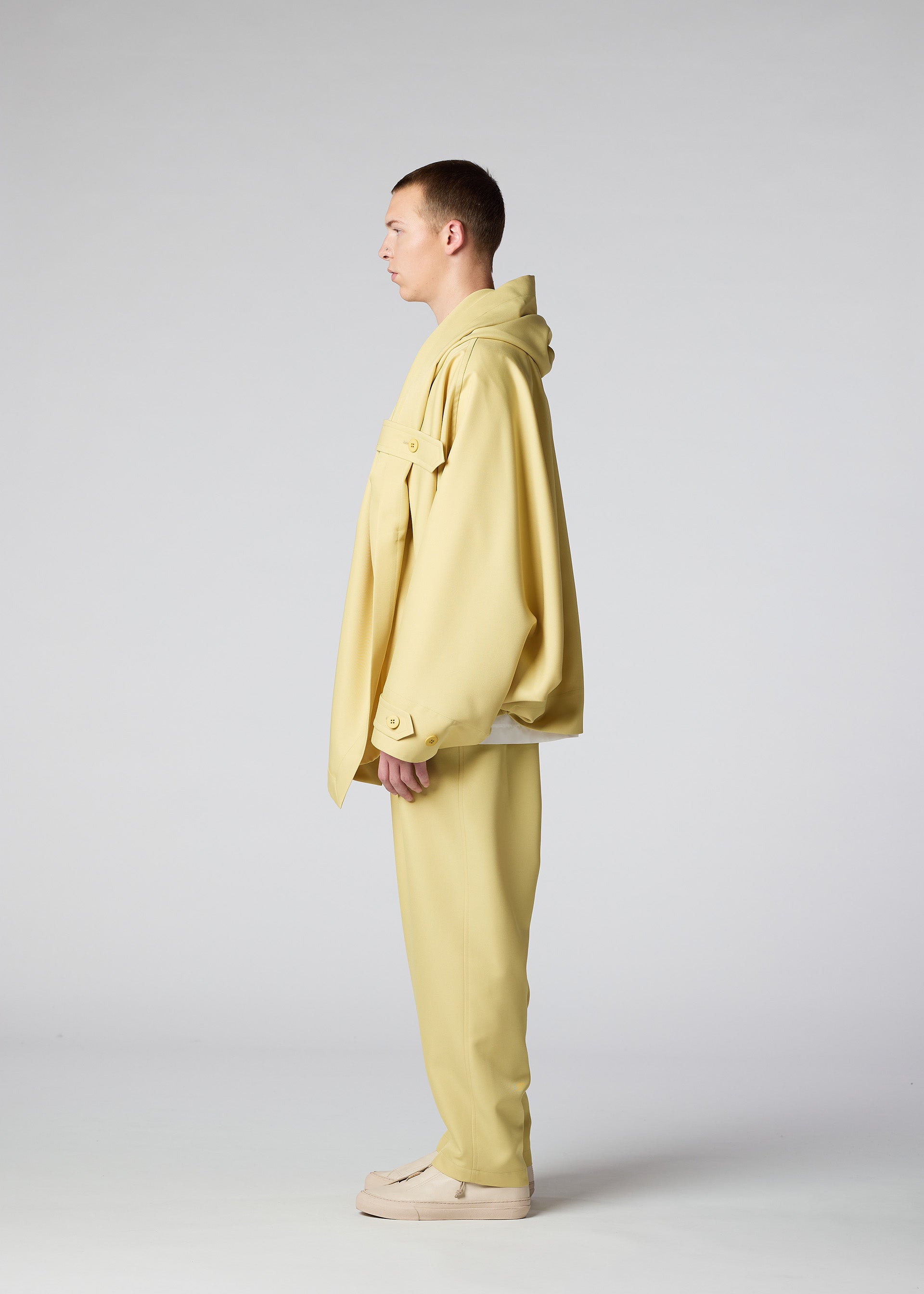 A model wears the IM MEN COCOON jacket.