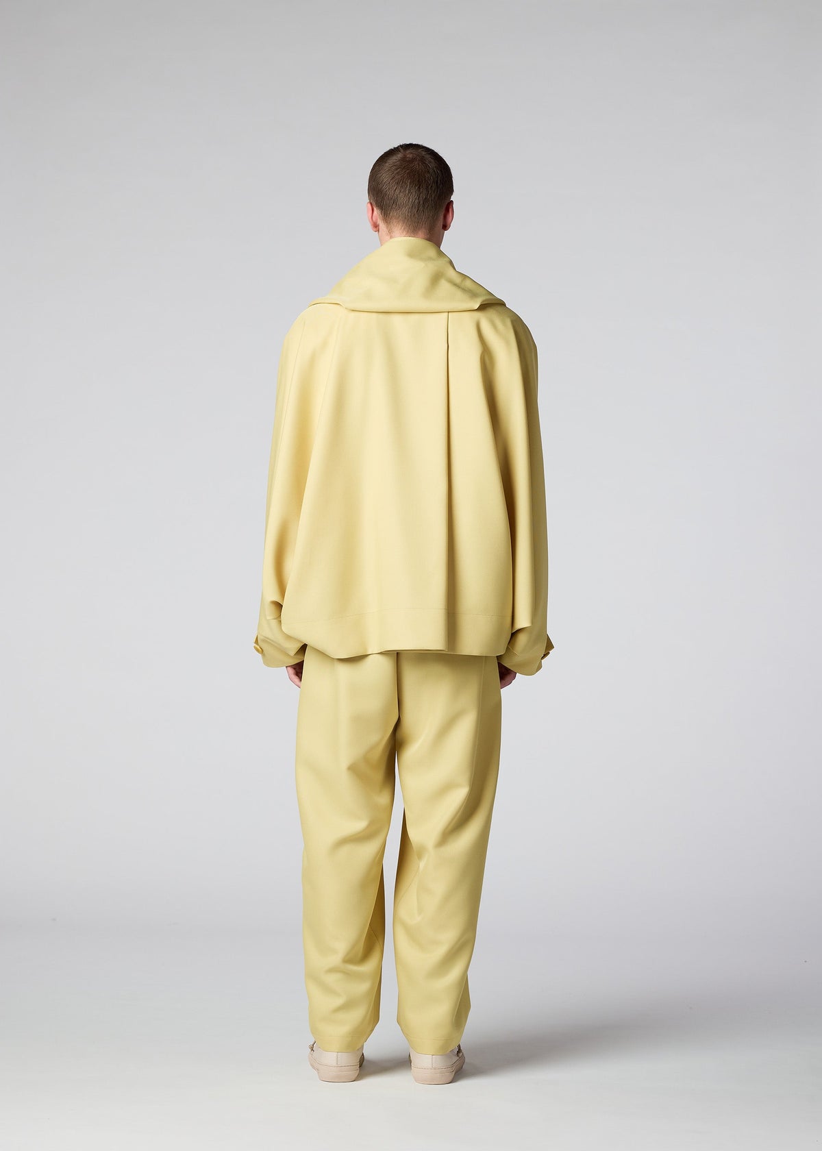 A model wears the IM MEN COCOON jacket.