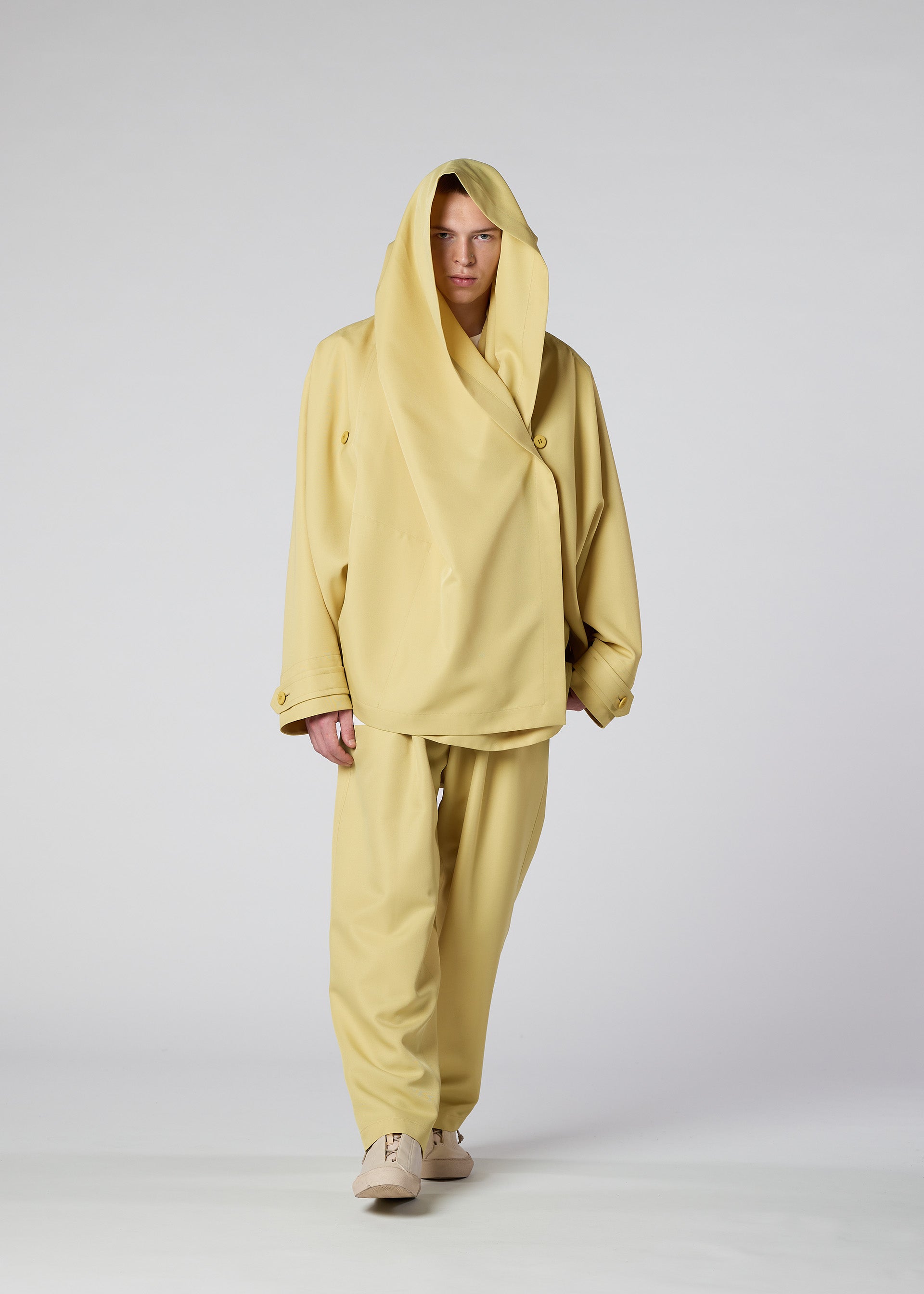 A model wears the IM MEN COCOON jacket.