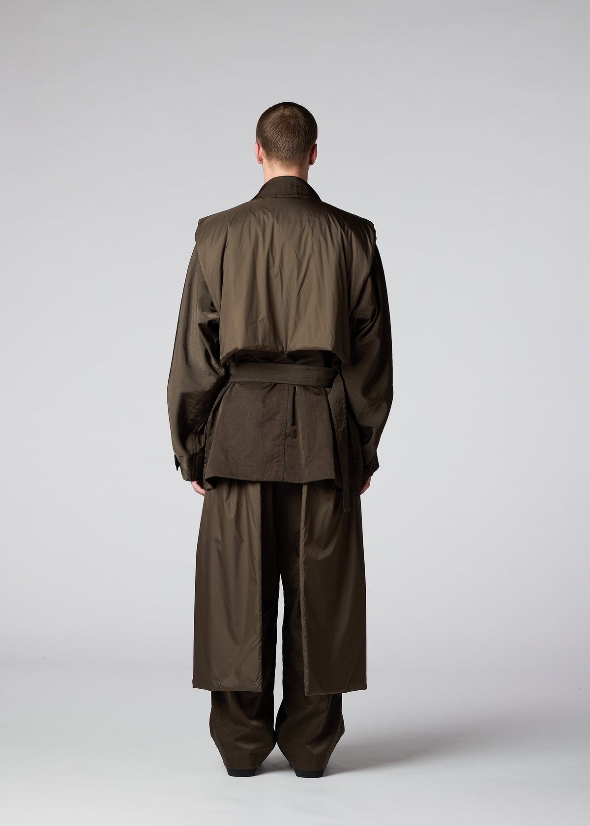 A model wears the IM MEN SWITCH jacket.