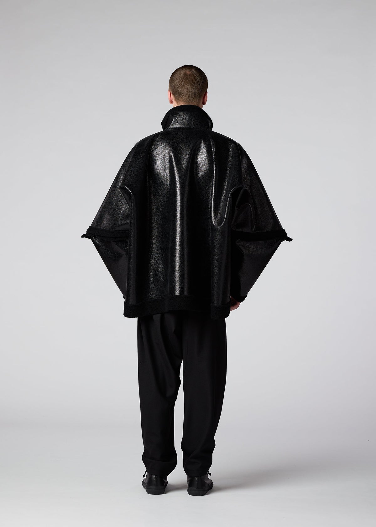 A model wears the IM MEN METALLIC ULTRA BOA jacket.