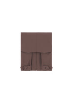 A detail shot of the IM MEN FLAT clothing.