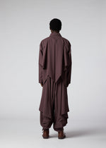 A model wears the IM MEN FLAT DRAPE clothing.