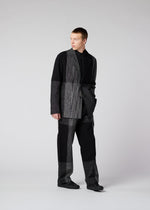 A model wears the IM MEN KASURI jacket.