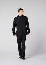 A model wears the IM MEN AIR PLEATS jacket.