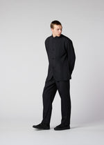 A model wears the IM MEN AIR PLEATS jacket.