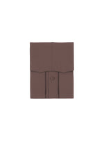 A detail shot of the IM MEN FLAT clothing.