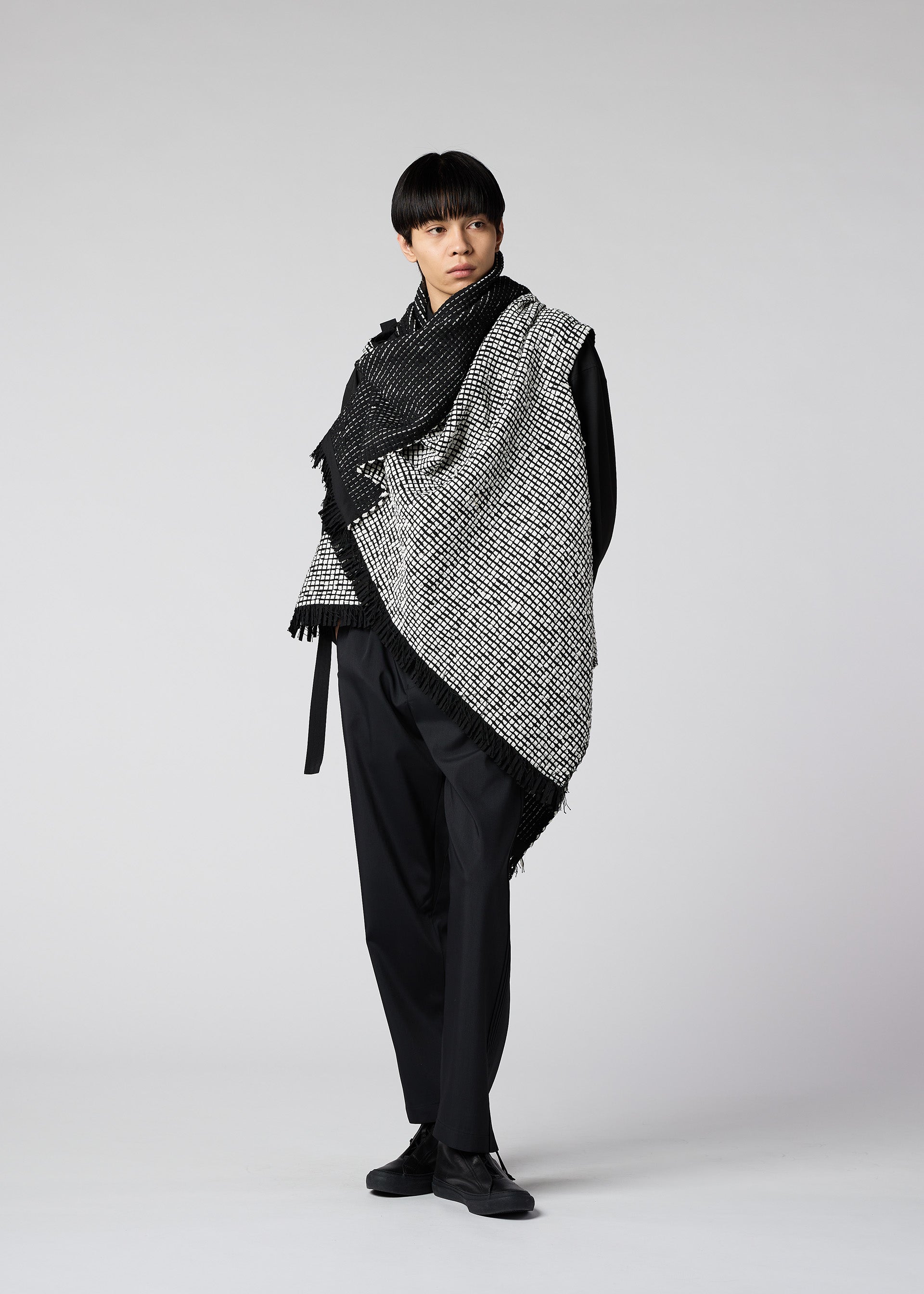 A model wears the IM MEN SAKIORI vest.