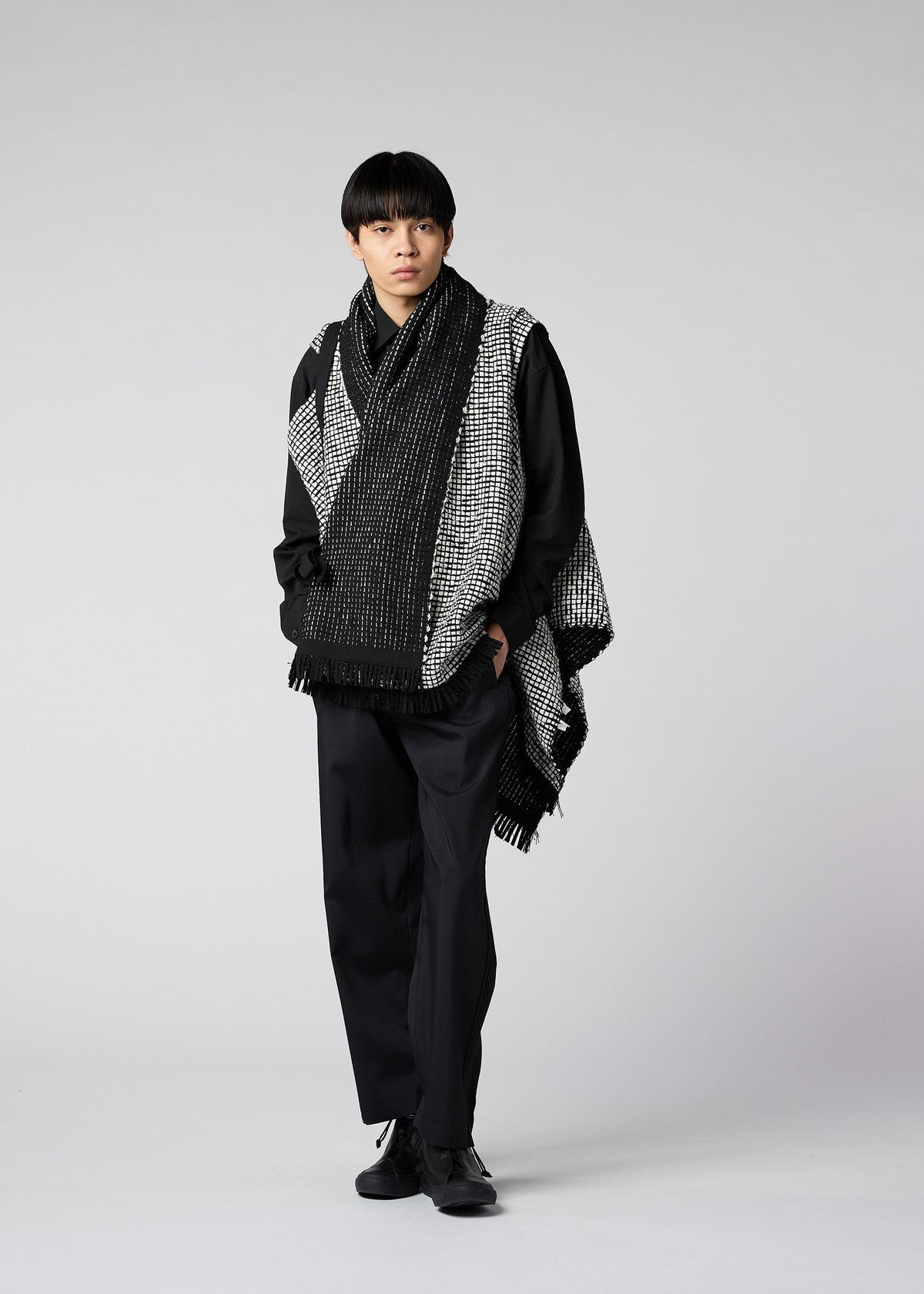 A model wears the IM MEN SAKIORI vest.