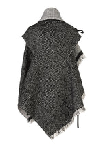 A detail shot of the IM MEN SAKIORI vest.