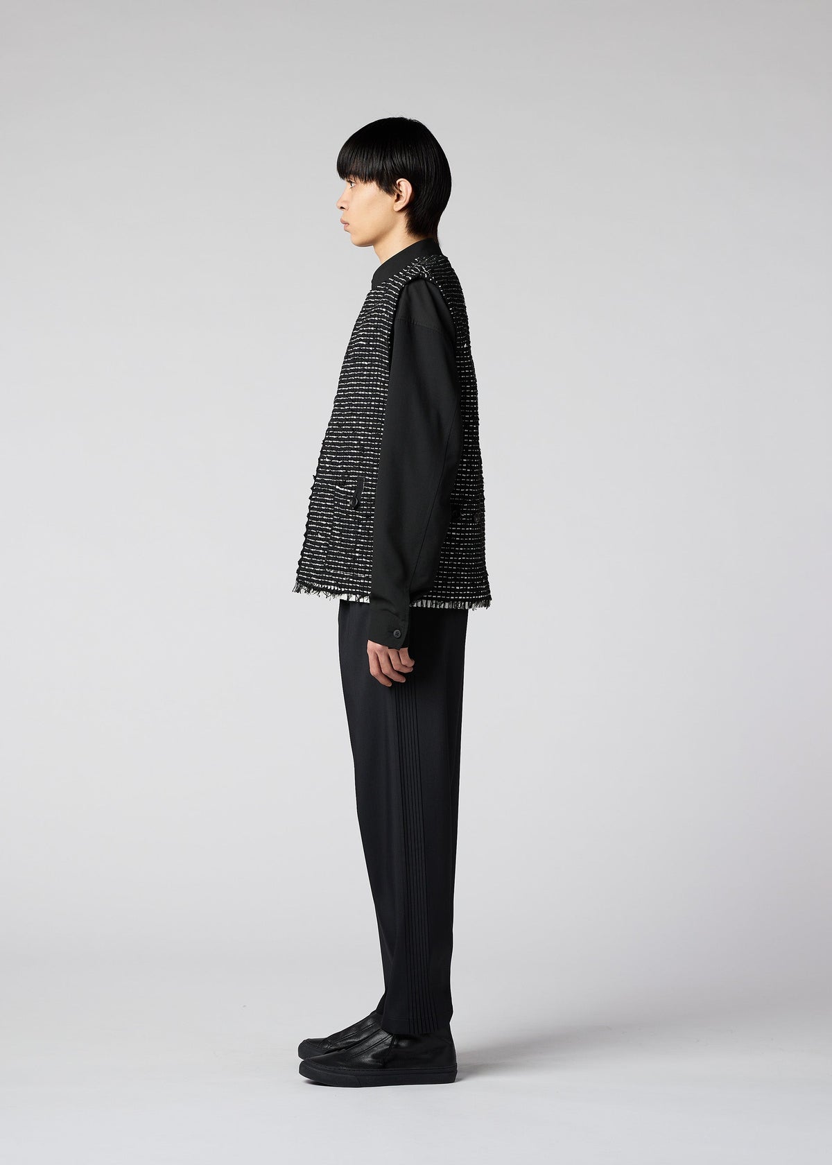 A model wears the IM MEN SAKIORI vest.