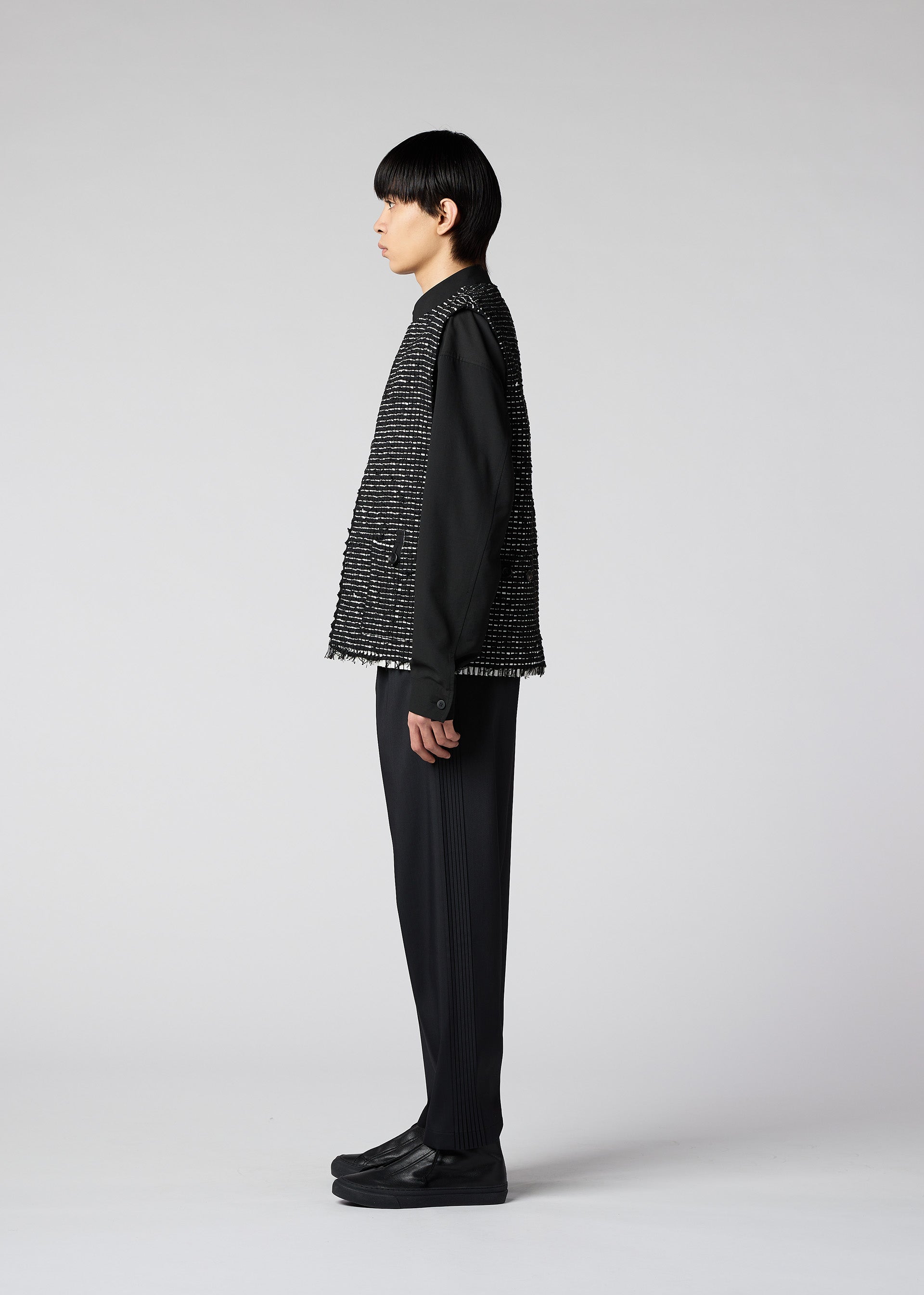 A model wears the IM MEN SAKIORI vest.