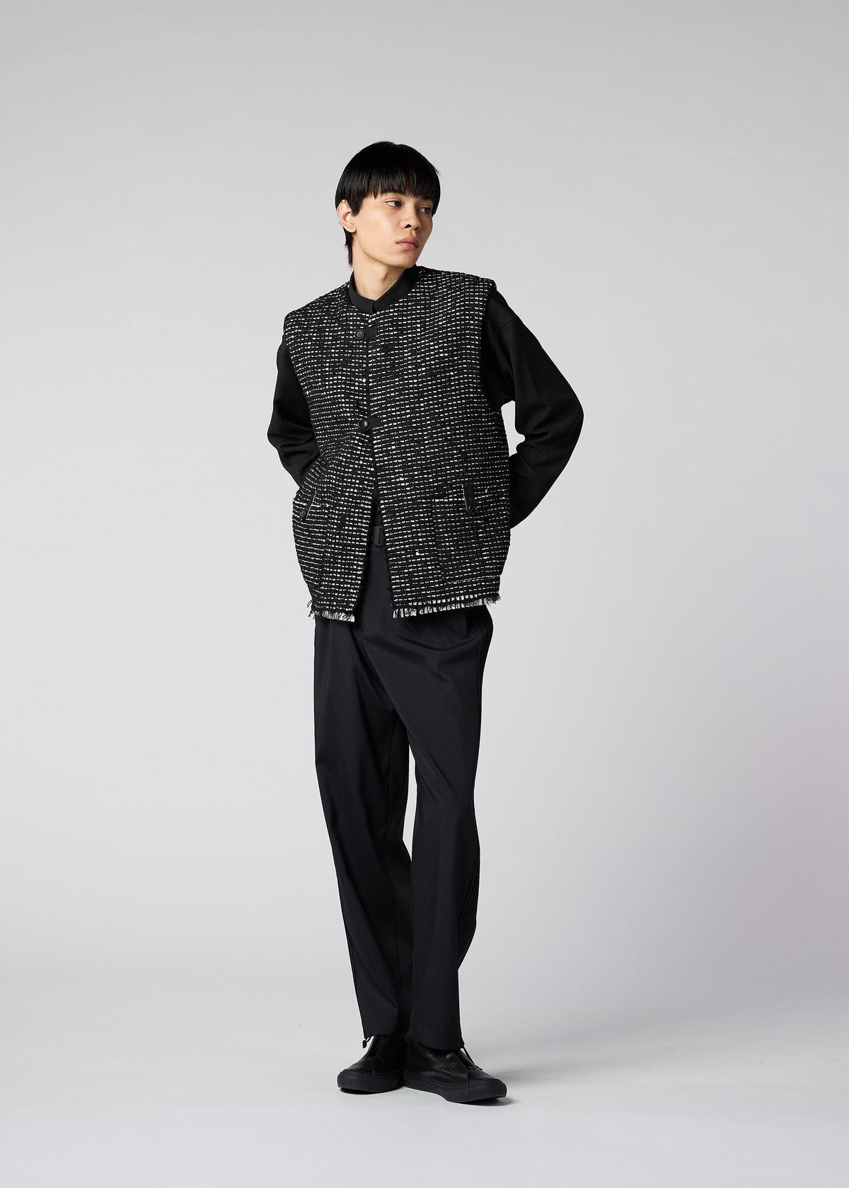 A model wears the IM MEN SAKIORI vest.