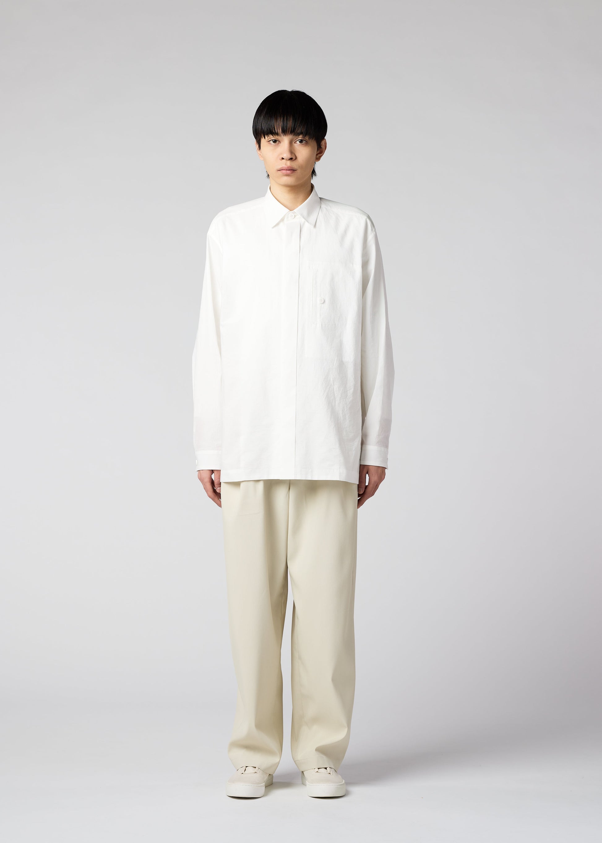 A model wears the IM MEN AIR trousers.
