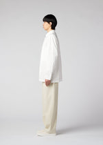 A model wears the IM MEN AIR trousers.
