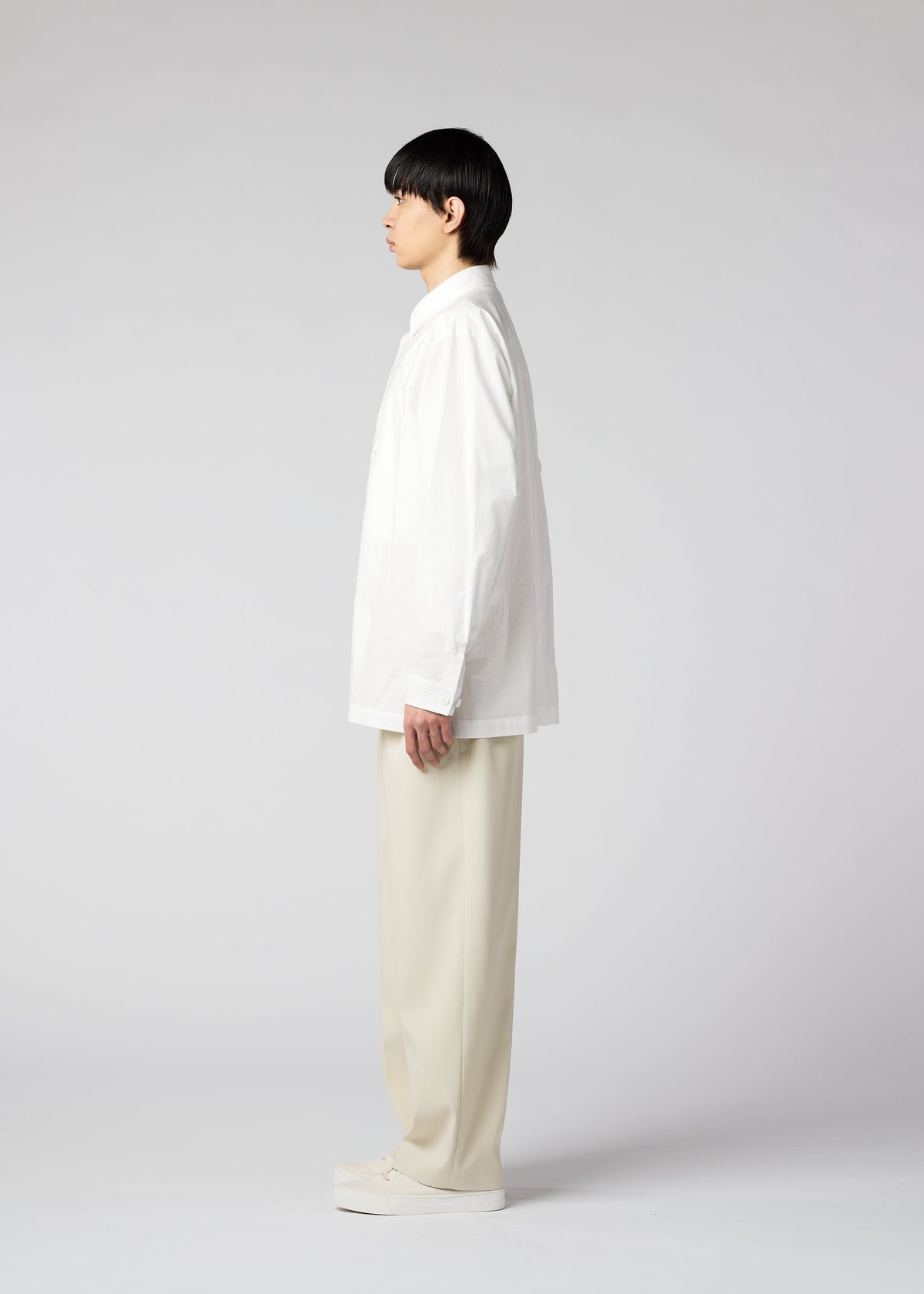 A model wears the IM MEN AIR trousers.
