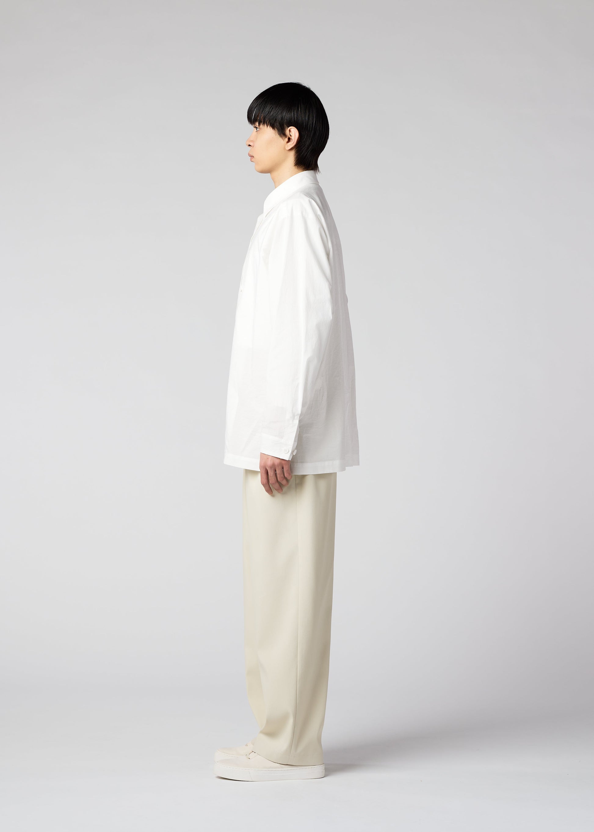 A model wears the IM MEN AIR trousers.