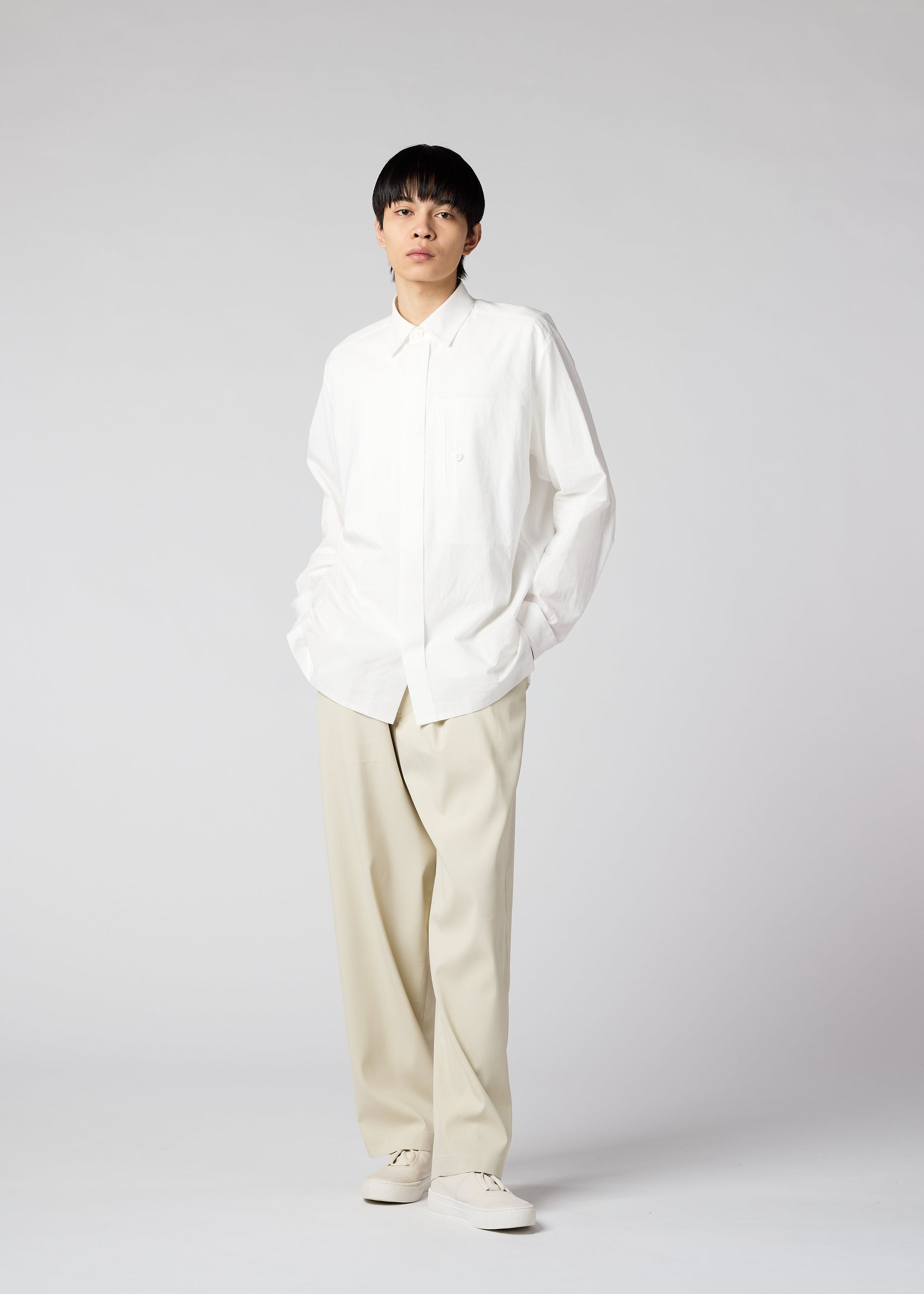 A model wears the IM MEN AIR trousers.