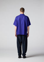 A model wears the IM MEN SWING trousers.