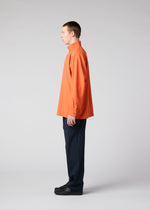 A model wears the IM MEN NAVY BOTTOMS trousers.