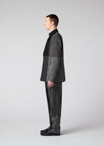 A model wears the IM MEN KASURI trousers.