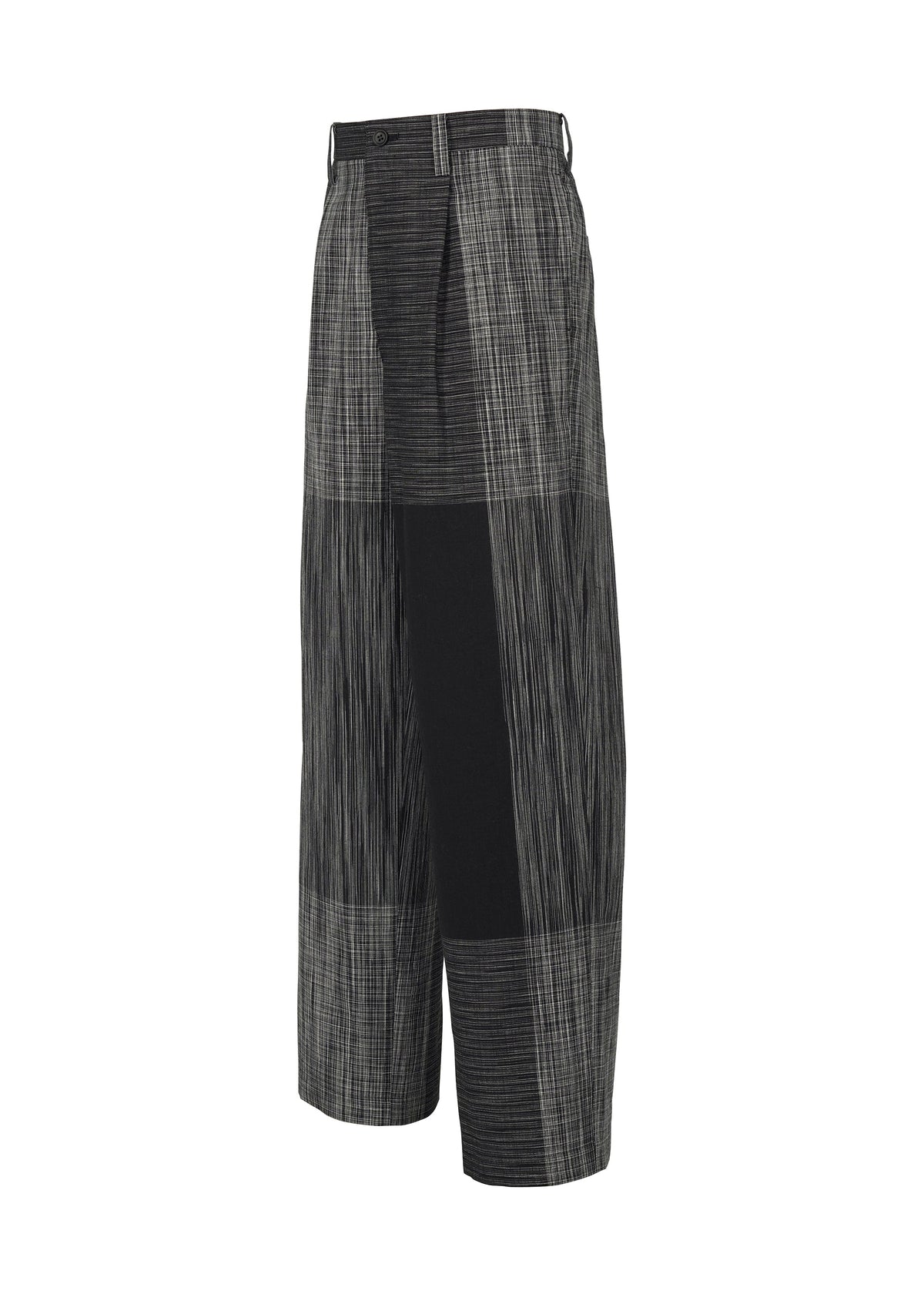A detail shot of the IM MEN KASURI trousers.