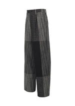 A detail shot of the IM MEN KASURI trousers.