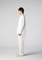 A model wears the IM MEN LIGHT COTTON trousers.