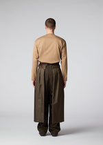 A model wears the IM MEN SWITCH trousers.