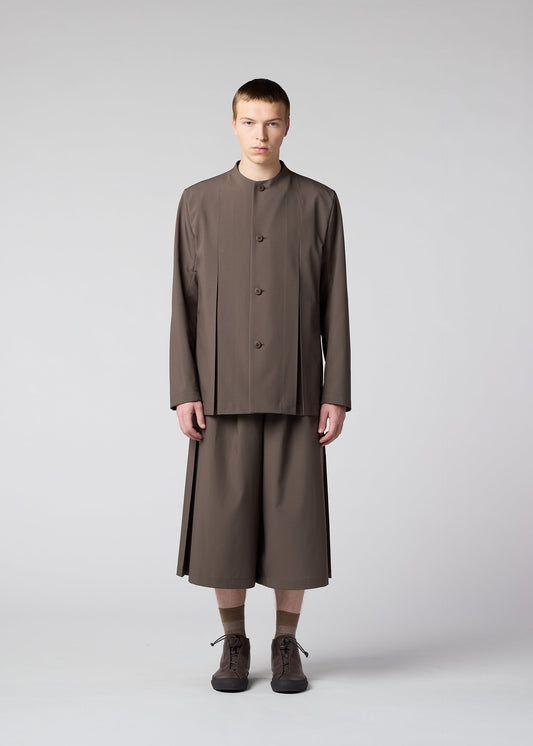 A model wears the IM MEN WINGS trousers.