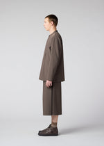 A model wears the IM MEN WINGS trousers.