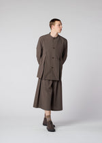 A model wears the IM MEN WINGS trousers.