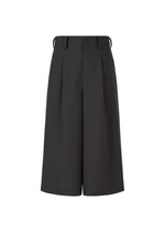 A product shot of the IM MEN WINGS trousers in black (15).