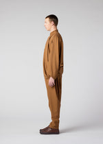 A model wears the IM MEN BREEZE trousers.