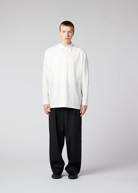 A model wears the IM MEN WHITE SHIRT shirt.