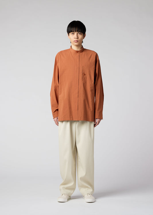 A model wears the IM MEN WHITE SHIRT shirt.
