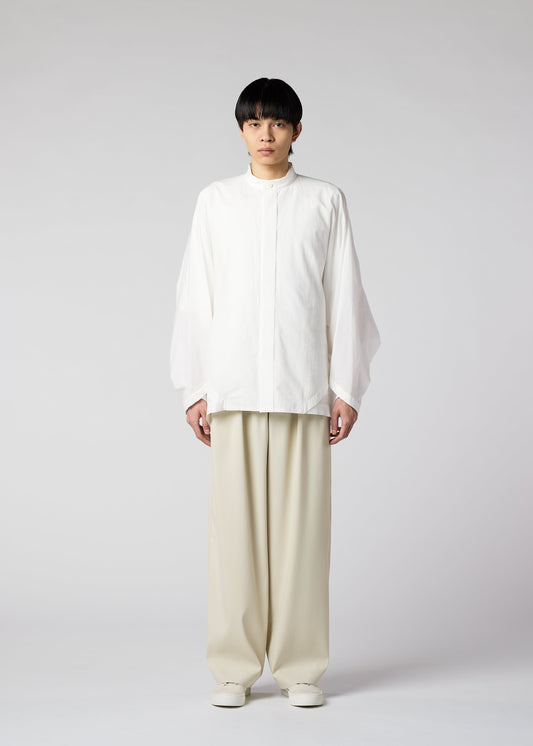 A model wears the IM MEN WHITE SHIRT shirt.