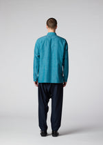 A model wears the IM MEN HYBRID SHIRT shirt.