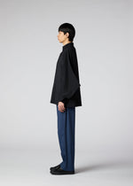 A model wears the IM MEN HYBRID SHIRT shirt.